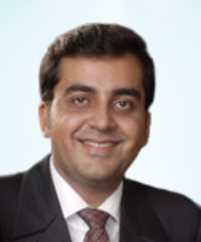 Dr. Tarun Baweja
