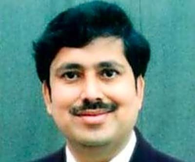  Dr. K M Suresh