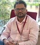 Dr. Tushar Adkar