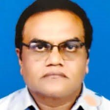 Dr. Mohan Pathak