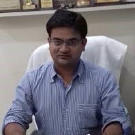 Dr. Dinesh Sharma